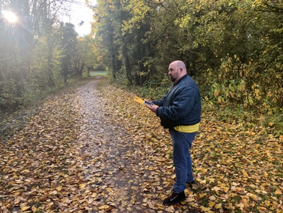 Mark Tomes looking at plans for housing development on Moons Moat Drive